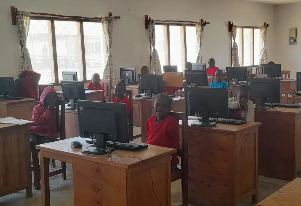 A computer room showing children on the computer